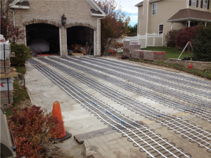 Heated Driveway Systems vs. Portable Driveway Heating Mats